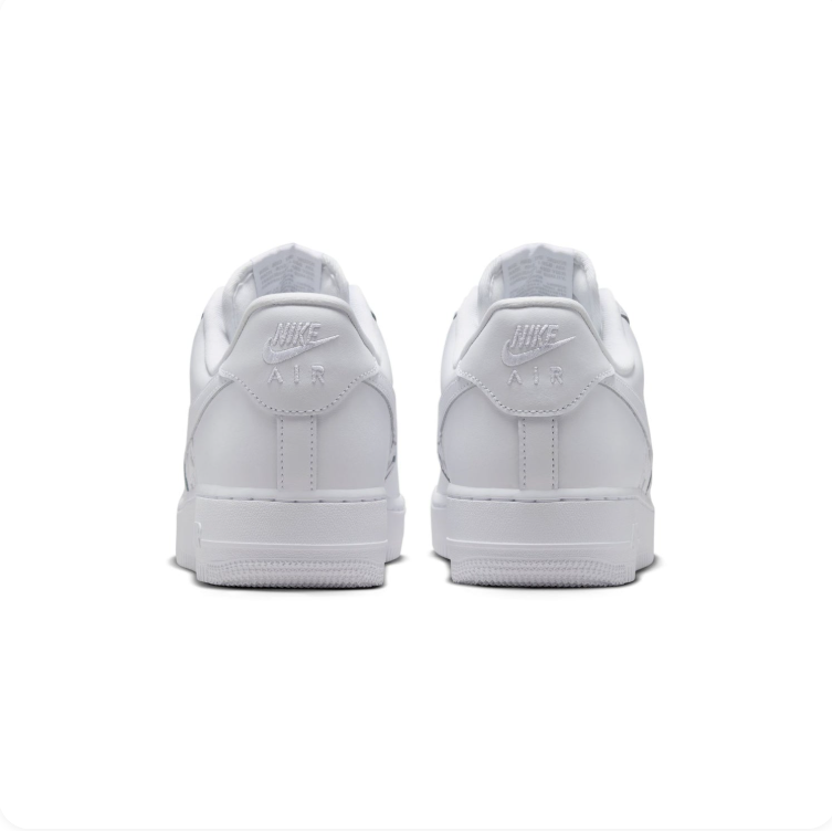 Nike Air Force 1 All-White Low-Top Sneakers with Star Details