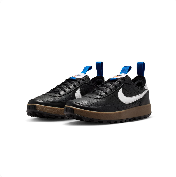 Nike Black & White Low-Top Sneakers with Brown Sole and Blue Pull Tabs