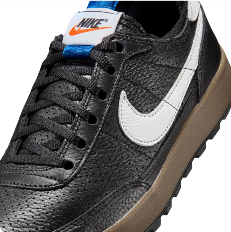 Nike Black & White Low-Top Sneakers with Brown Sole and Blue Pull Tabs