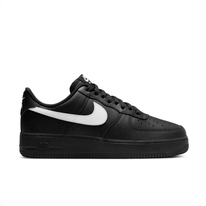 Nike Black Low-Top Sneakers with White Swoosh