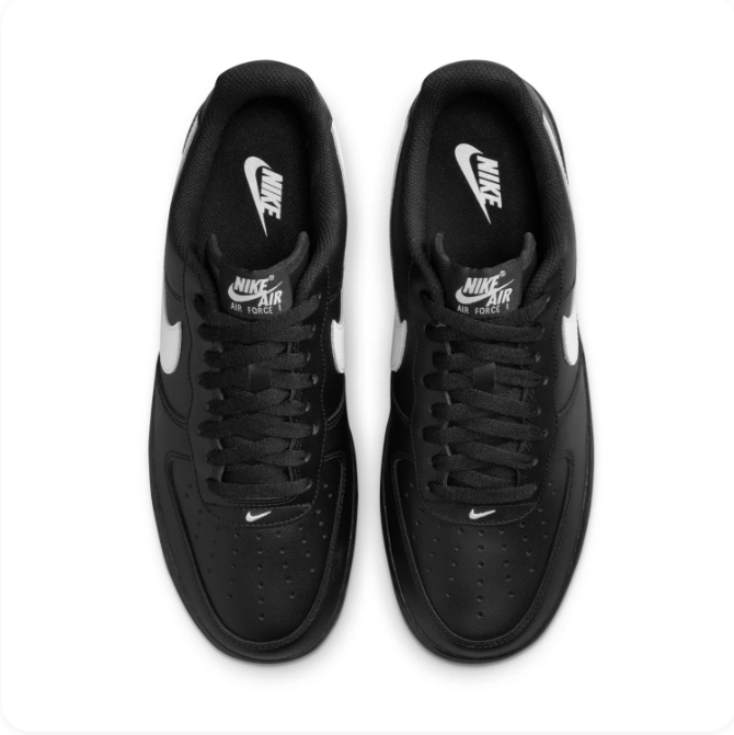 Nike Black Low-Top Sneakers with White Swoosh