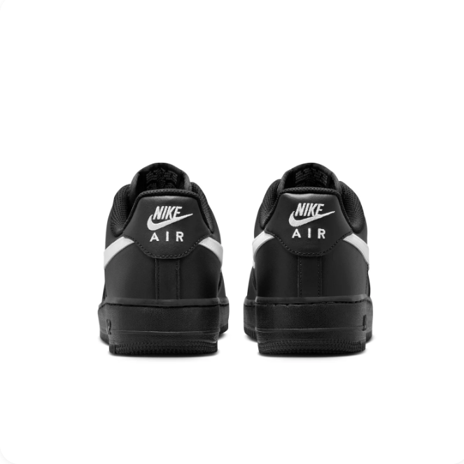Nike Black Low-Top Sneakers with White Swoosh