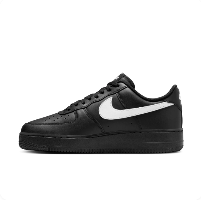 Nike Black Low-Top Sneakers with White Swoosh