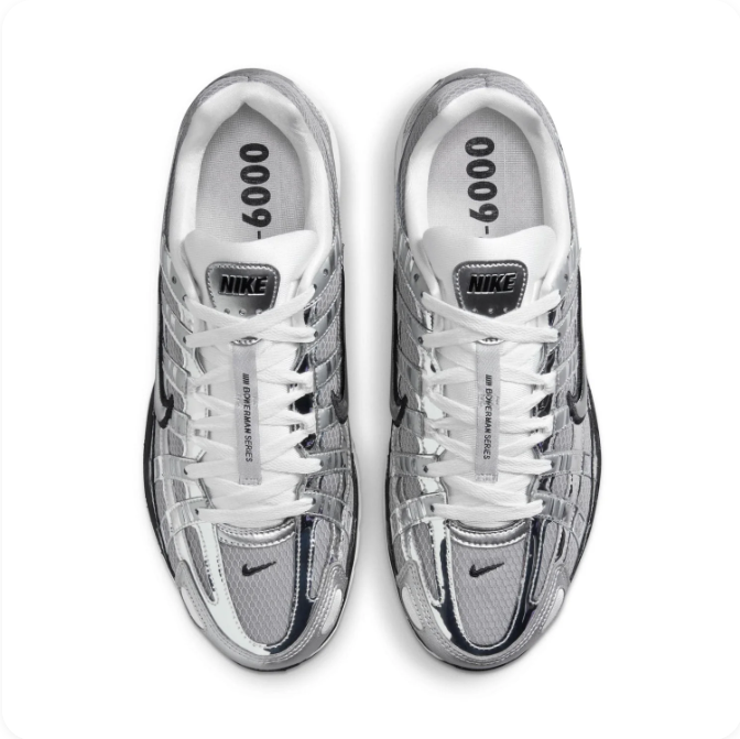 Nike Metallic Silver & Grey Low-Top Sneakers with Black-Outlined Swoosh