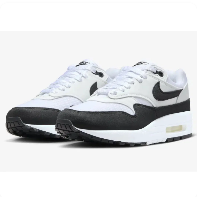 Nike White & Black Low-Top Sneakers with Visible Air Heel