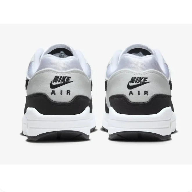 Nike White & Black Low-Top Sneakers with Visible Air Heel