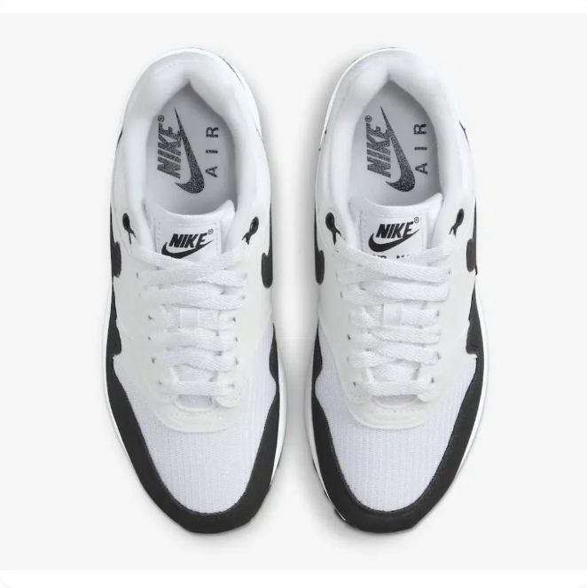 Nike White & Black Low-Top Sneakers with Visible Air Heel