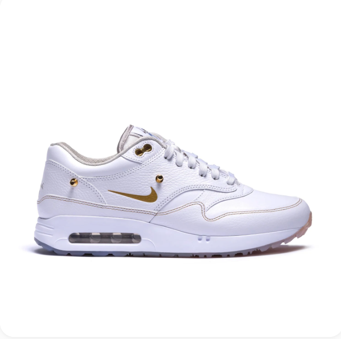Nike White Low-Top Sneakers with Gold-Tone Details & Multicolor Outsole