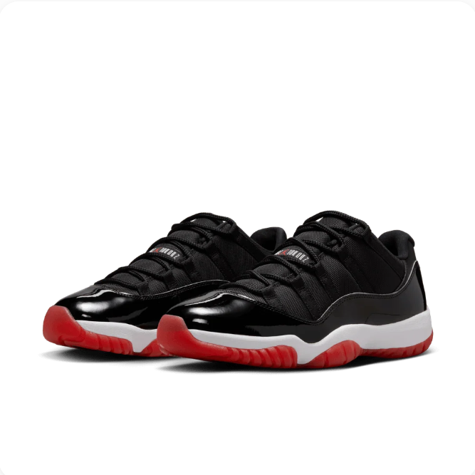 Air Jordan Black Low-Top Sneakers with Glossy Panels & Red Outsole
